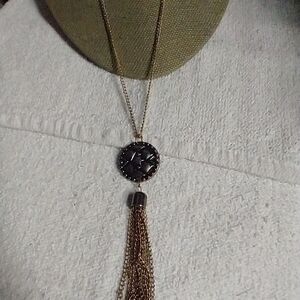 Long goldtone tassel coin chain necklace